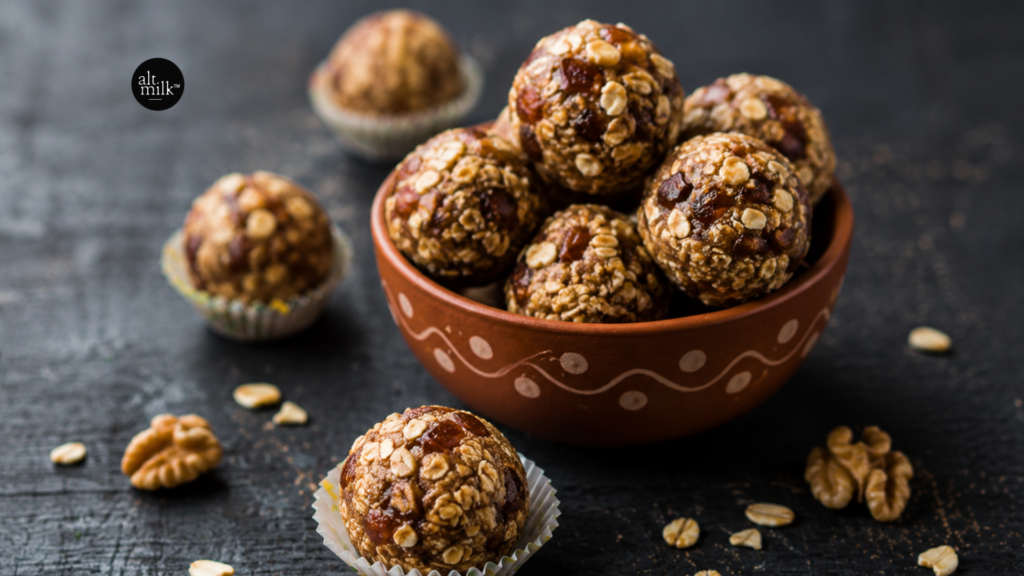 Walnut butter energy balls with dates and oats served in a bowl